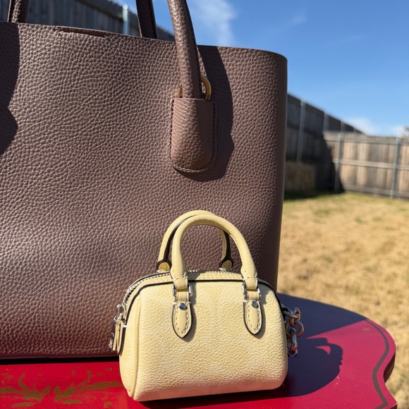 Coach Womens Mini Rowan Bag Charm NWT Pale Yellow Leather Quiet Luxury Keychain - Picture 4 of 5